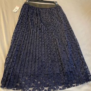 Navy blue pleated lace skirt.